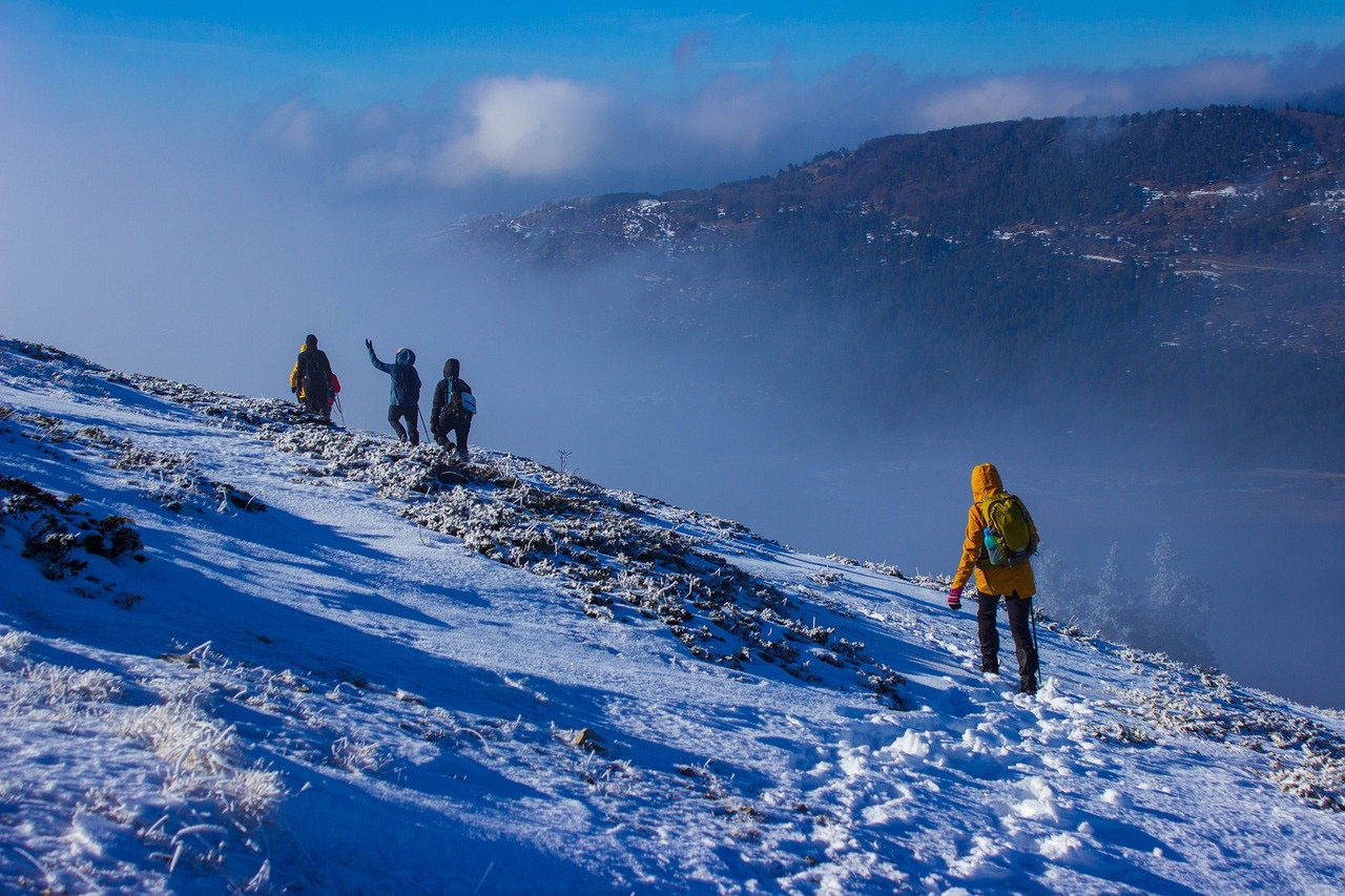 people climbing mountain